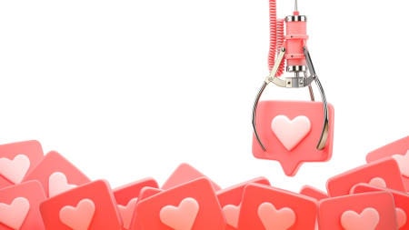 Illustration mit Greifarm vom Rummelplatz: Nutzer in sozialen Medien sollten sich nicht von zu vielen Likes blenden lassen. Foto: picture alliance / Zoonar | Maksym Yemelyanov